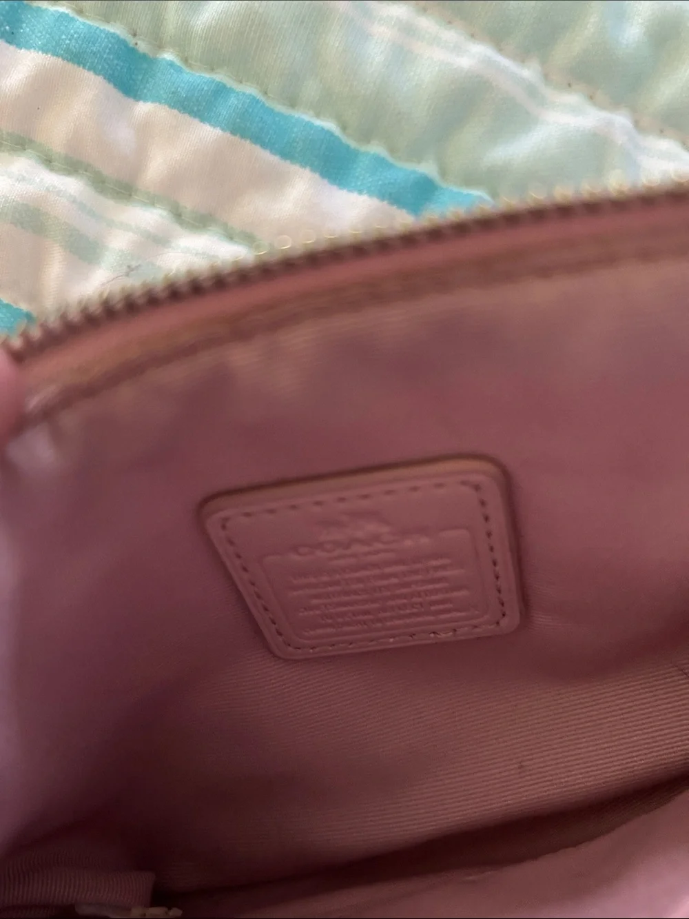 Coach Pink Leather Heart Wristlet with Red & Silver Hearts.  Two small marks